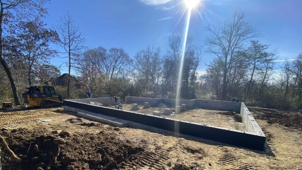 Construction Site With A Foundation Being Poured 1024x576