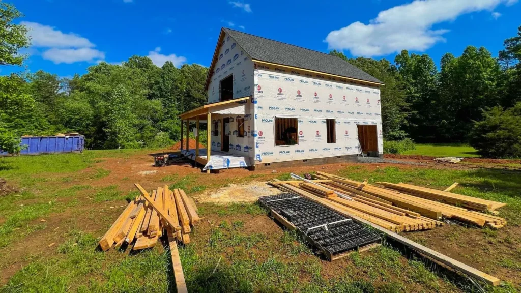 Construction Site With Building Materials And Framing 1024x576